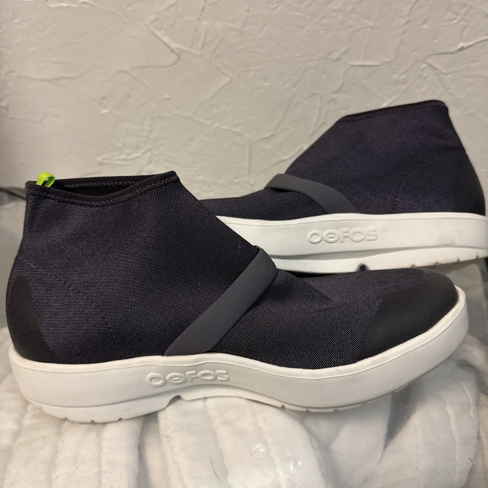 OOFOS Women's Slip-On Athletic Sneakers in Black with White Sole